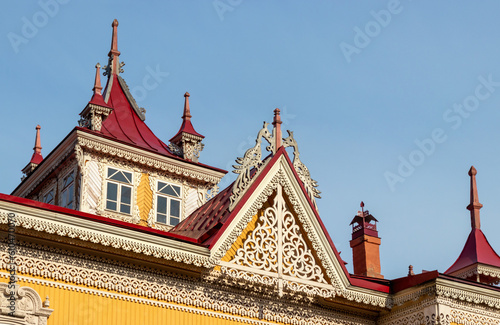 Old house with firebirds in Tomsk, Russian traditional wood carving
