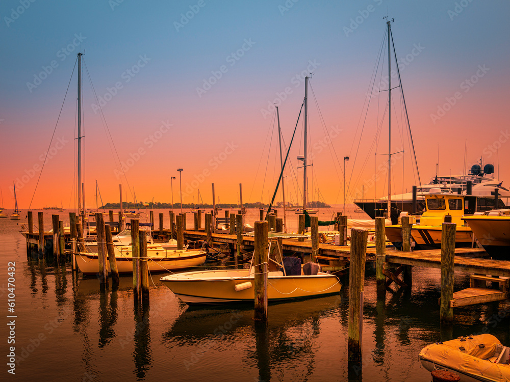 Fototapeta premium Sunset in the harbor. Wildfire smoke over the Mystic River marina in Connecticut