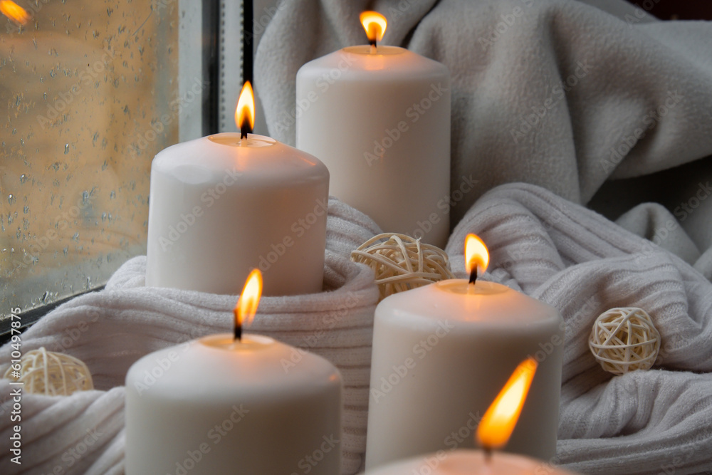 Home fragnance concept autumn holidays at cozy home on the windowsill Hygge aesthetic atmosphere on knitted white sweater. Still life of micro moment candid slow living. Mental health wellbeing Home fragnance concept autumn holidays at cozy home on the windowsill Hygge aesthetic atmosphere on knitted white sweater. Still life of micro moment candid slow living. Mental health wellbeing