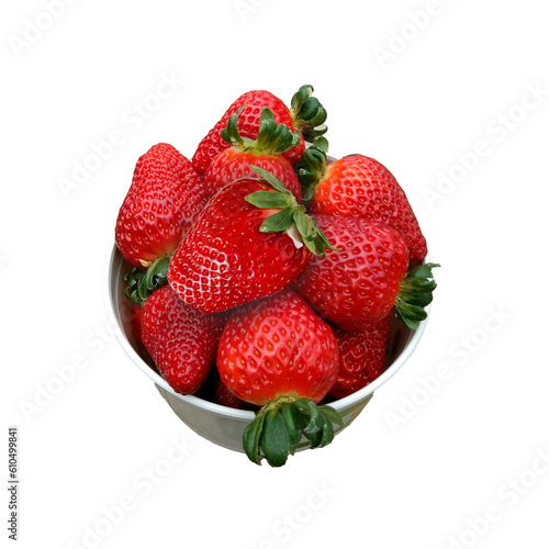 Fresh ripe delicious strawberries in a white bowl on transparent background