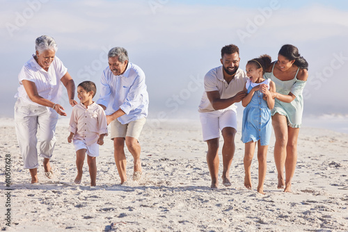 Big family, grandparents or happy kids walking on beach to relax with siblings on fun holiday together. Dad, mom or children love bonding, smiling or playing with senior grandmother or grandfather