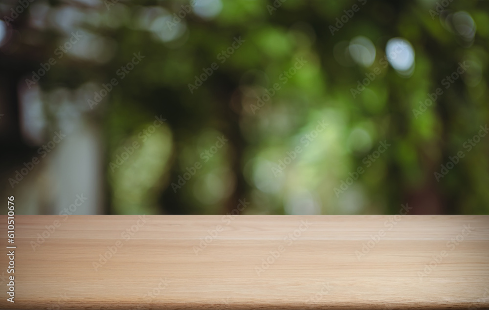 Empty wood table top and blur of out door garden background Empty wooden table space for text marketing promotion. blank wood table copy space for background Empty wood table top and blur of out door garden background Empty wooden table space for text marketing promotion. blank wood table copy space for background