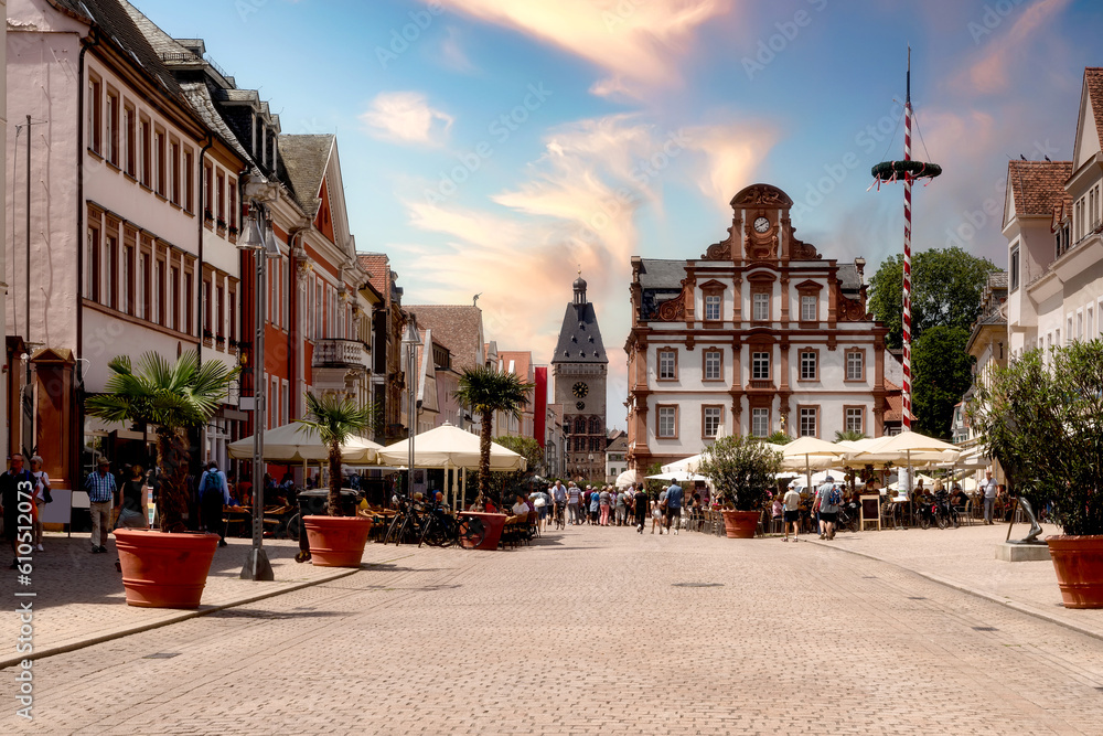 Cityscape of Speyer on a sunny day at sunset with historic buildings and town hall, Germany