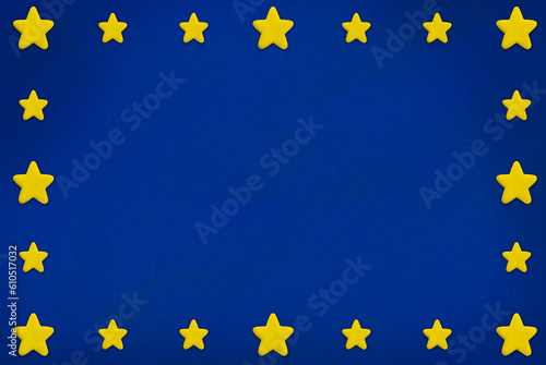 plasticine yellow star border on blue background