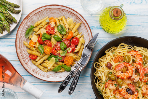 Italian pasta adorned with fresh tomatoes and aromatic basil