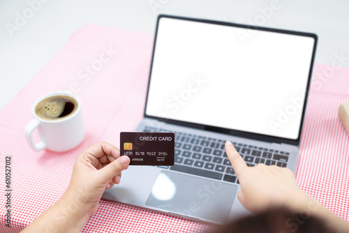 Happy Asian fat women friend excited in online shopping with special discount and using credit card to make a payment. Two Asian fat women staying together and buying goods in e-commerce website.