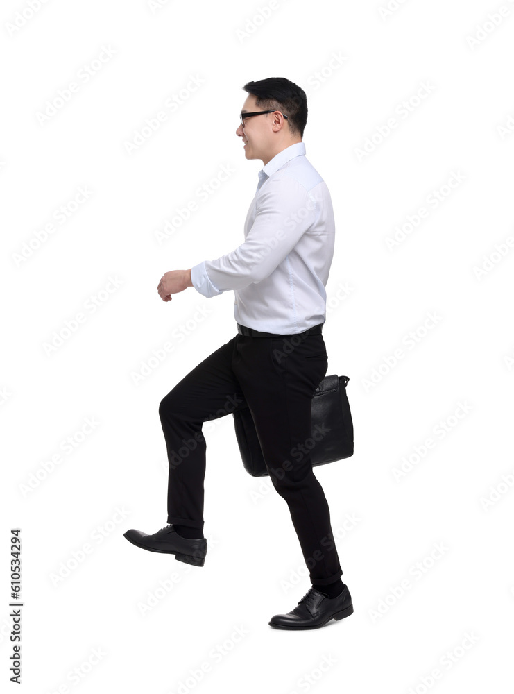 Businessman with briefcase walking on white background Businessman with briefcase walking on white background