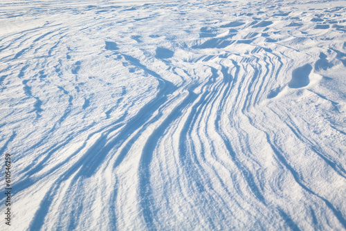 Snow waves surface . White winter snow background