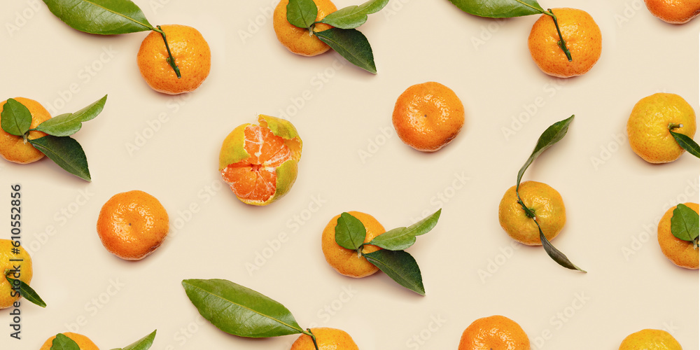 Ripe fresh orange yellow tangerines with green leaves, whole and peeled on beige background, trendy pattern. Citrus fruits mandarins, still life aesthetic photo, creative layout, fruit banner Ripe fresh orange yellow tangerines with green leaves, whole and peeled on beige background, trendy pattern. Citrus fruits mandarins, still life aesthetic photo, creative layout, fruit banner