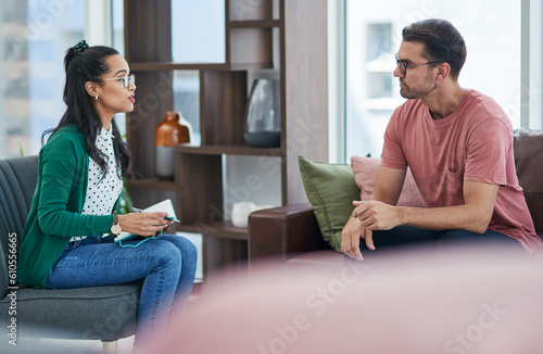 Картината върху платно Mental health, psychology or counseling with a woman therapist and male patient talking in her office