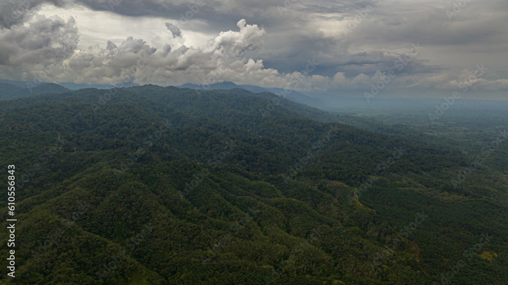 Mountain landscape with mountain peaks covered with forest. Sumatra, Indonesia.