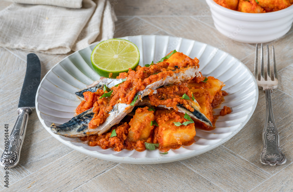 Fried mackerel with spicy sauce and bomay potatoes Fried mackerel with spicy sauce and bomay potatoes
