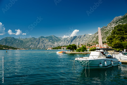 Beautiful view with white yacht in the port of Kotor