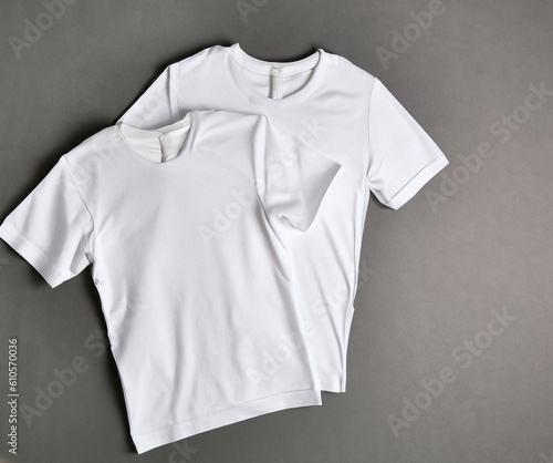 white blank t shirt on grey background