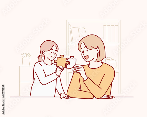 mother and kid daughter doing playing puzzle toy together on the table in children room. Hand drawn style vector design illustrations.