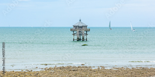 Tableau sur toile The Phare du Bout du Monde, a wooden lighthouse at the Pointe des Minimes in La