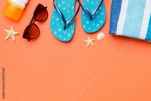 Summer vacation concept flat lay. straw hat beach accessories and towel top view. Space for text. travel concept