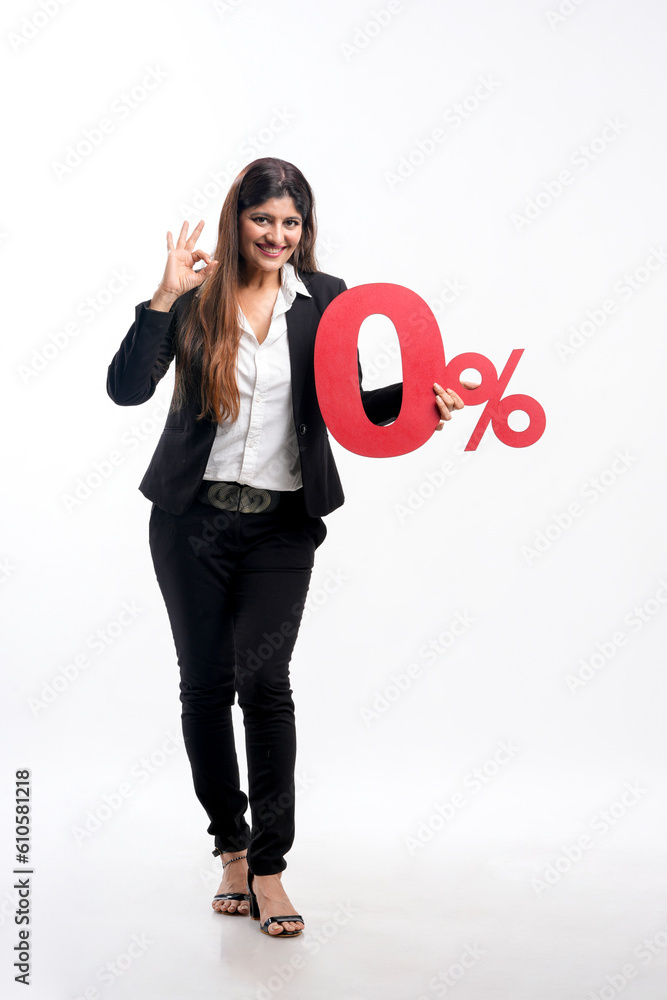 Indian businesswoman or employee showing zero percent board on white background. Indian businesswoman or employee showing zero percent board on white background.