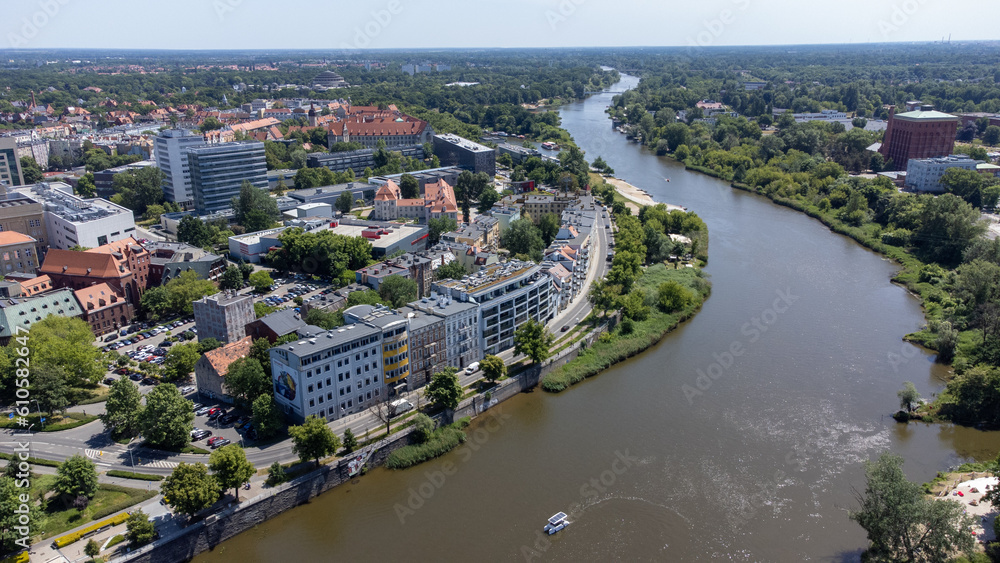 Aerial view, general cityscape of Wroclaw city, Poland. Odra river and buildings.