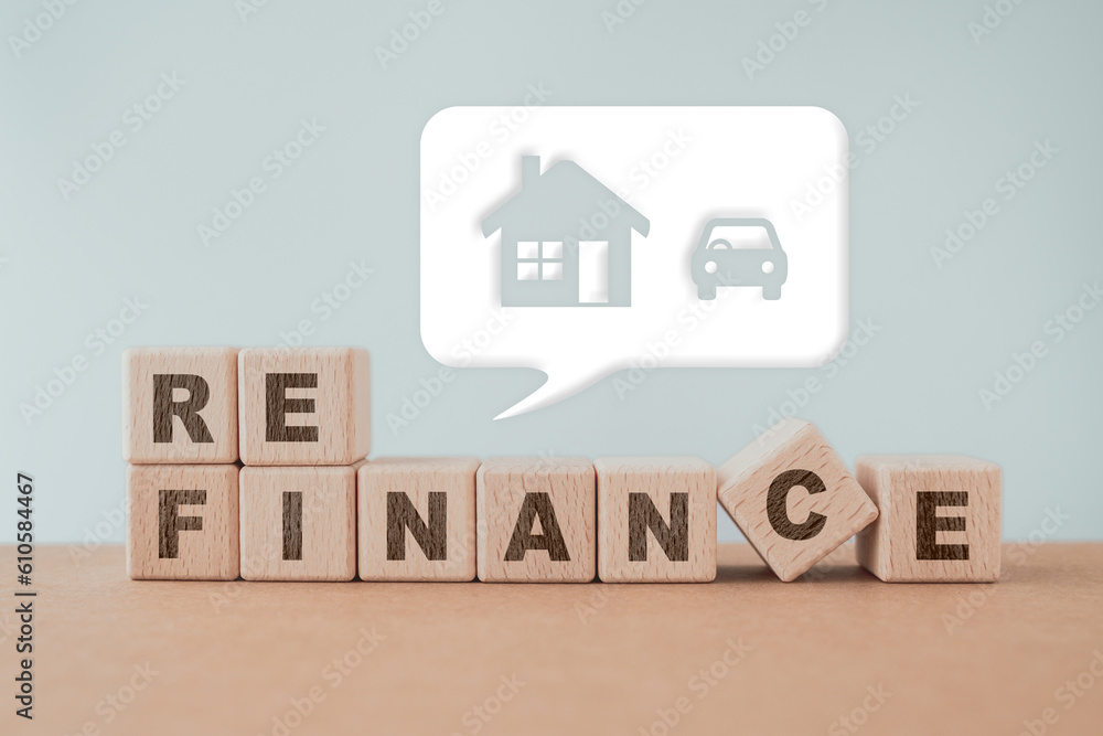 Property investment and house mortgage refinance real estate and automobile concept, REFINANCE word on wooden cube block and white speech bubble with house and car icon Property investment and house mortgage refinance real estate and automobile concept, REFINANCE word on wooden cube block and white speech bubble with house and car icon