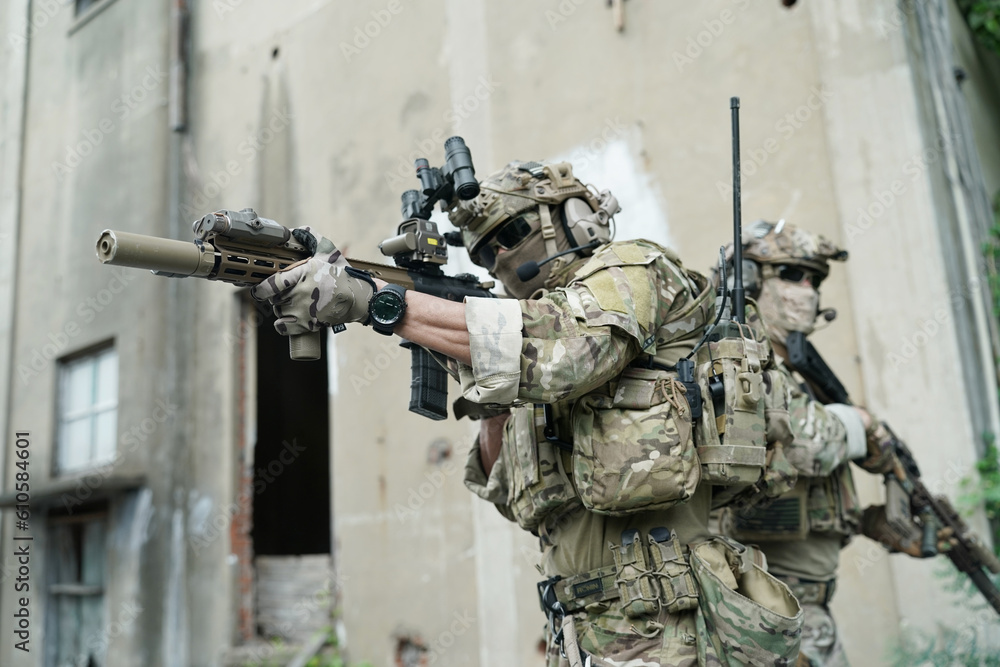 Fototapeta premium Military Soldiers Storming the Enemy Building