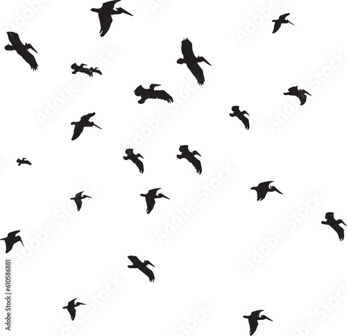 Black vector flying birds flock silhouettes isolated on white background © Pixzot