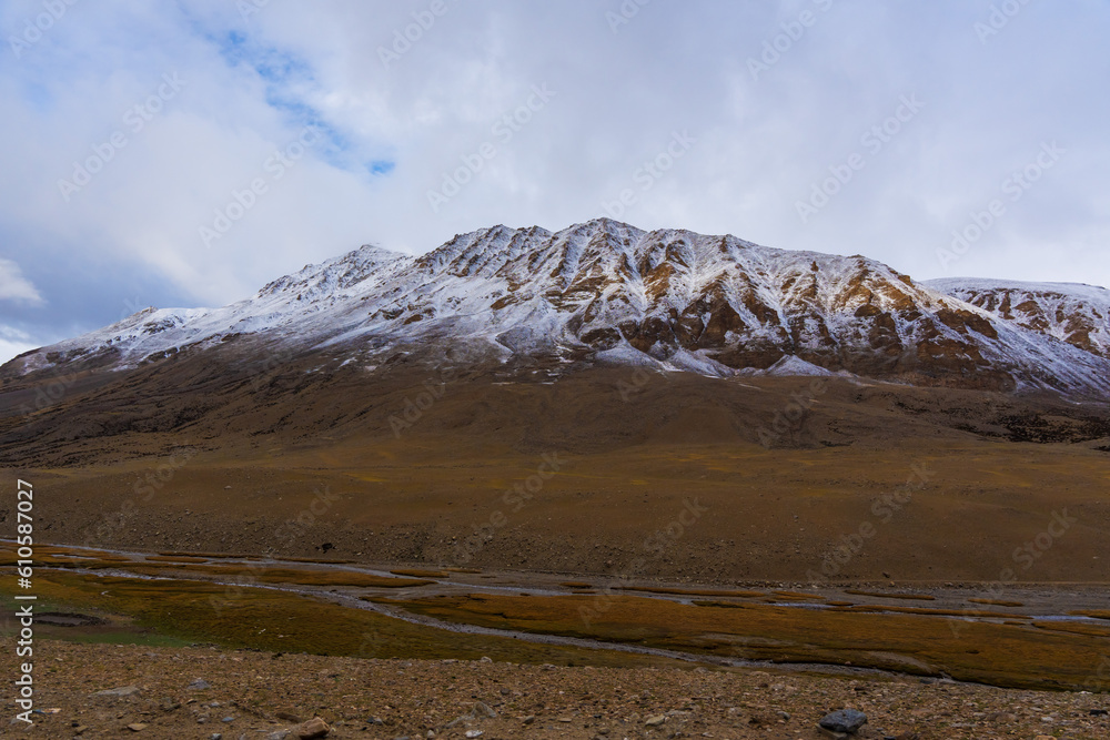 the road, snow cover the mountain, and Tso Kar lake, Beautiful scenery along the way at Ladakh, India the road, snow cover the mountain, and Tso Kar lake, Beautiful scenery along the way at Ladakh, India