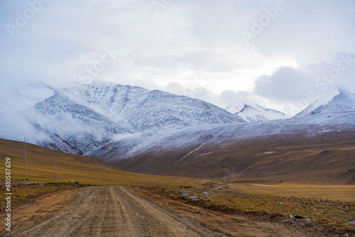 snow covered mountains, cloudy sky at the way from Moriri lake to Leh city, Ladakh, India © Nhan