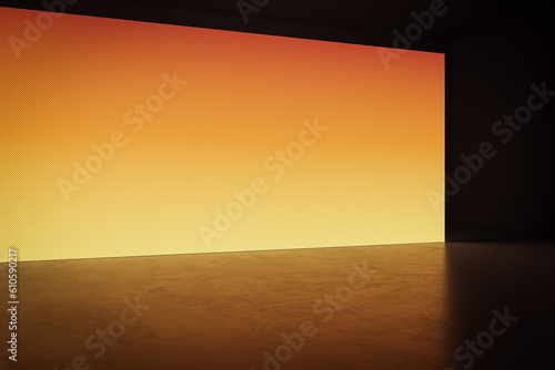 Fototapeta Naklejka Na Ścianę i Meble -  Perspective view of blank orange digital screen wall and concrete floor background. 3D Rendering