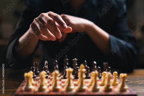 Close up of Hand playing a chess game. Concept of business strategy, planning, Success, leadership, victory, challenge. Smart powerful move. Thinking, marketing, management team and achievement tactic