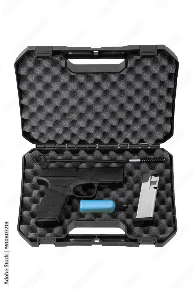 Modern semi-automatic pistol. A short-barreled weapon for self-defense. Arming the police, special units and the army. Weapon in a case for storage and transportation. Isolate on a white back. Modern semi-automatic pistol. A short-barreled weapon for self-defense. Arming the police, special units and the army. Weapon in a case for storage and transportation. Isolate on a white back.
