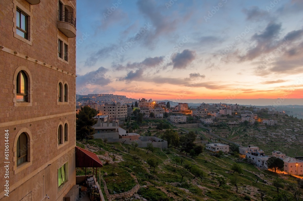 Sunset over the ancient city of Bethlehem. Photo of the Israeli city of Palestine during the trip. Breathtaking colorful sunset