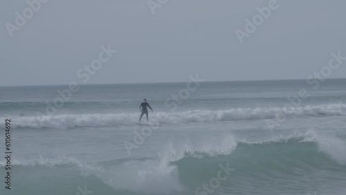 Beach with surfer