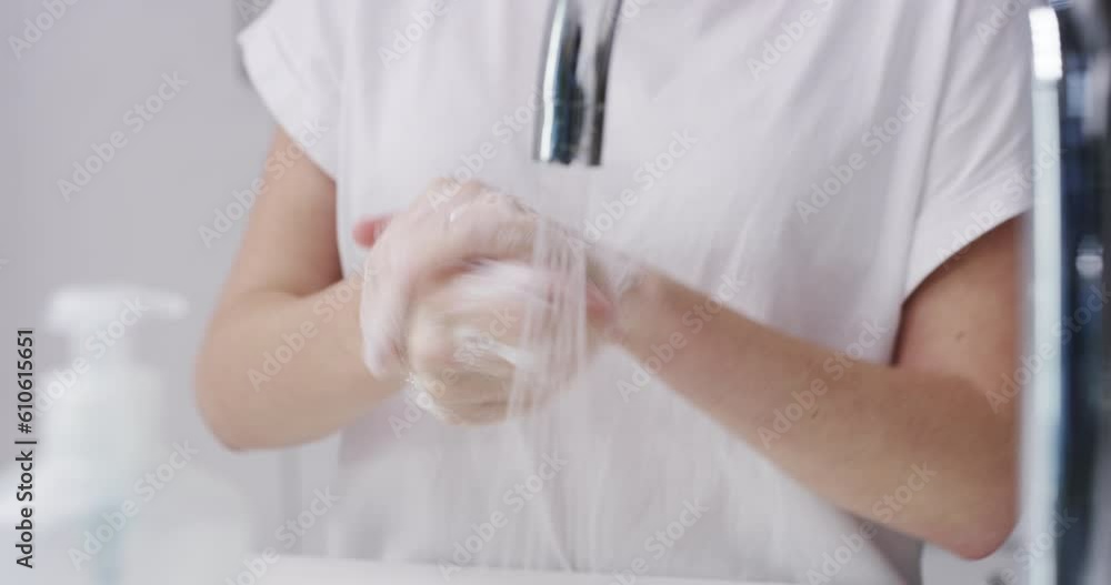 Soap, water and person washing hands at tap for skincare, healthy dermatology and safety of bacteria at home. Closeup, hand and cleaning palm with foam at basin for hygiene routine, wellness or habit Soap, water and person washing hands at tap for skincare, healthy dermatology and safety of bacteria at home. Closeup, hand and cleaning palm with foam at basin for hygiene routine, wellness or habit