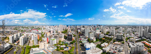Aerial panorama above Abraham Lincoln street in the city center. Skyscrapers and office buildings in downtown of Santo Domingo Dominican Republic