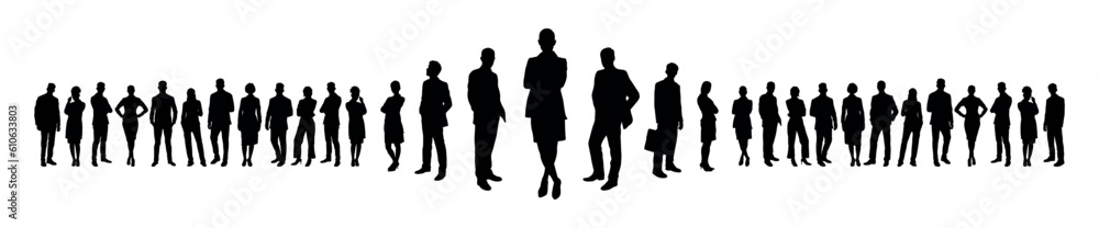 Confident business team standing and posing in front of people crowd silhouette.