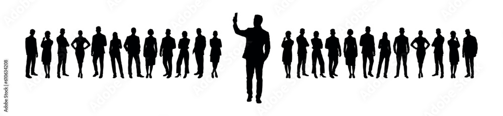 Businessman standing and taking selfie in front of business people crowd silhouette.