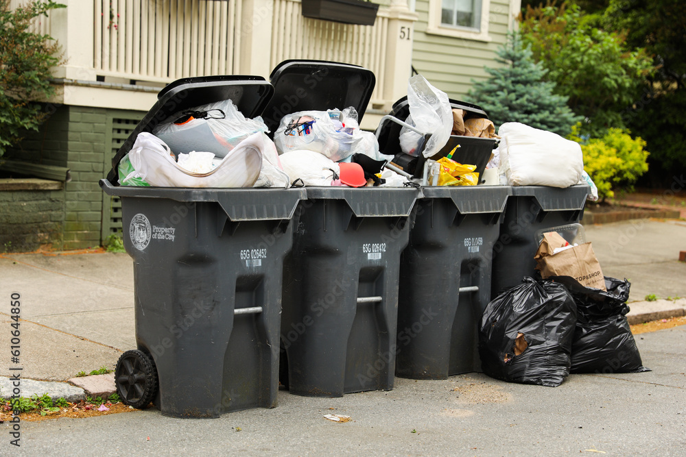 Trashcans symbolize waste management, cleanliness, responsible disposal, and the importance of maintaining a tidy and hygienic environment Trashcans symbolize waste management, cleanliness, responsible disposal, and the importance of maintaining a tidy and hygienic environment