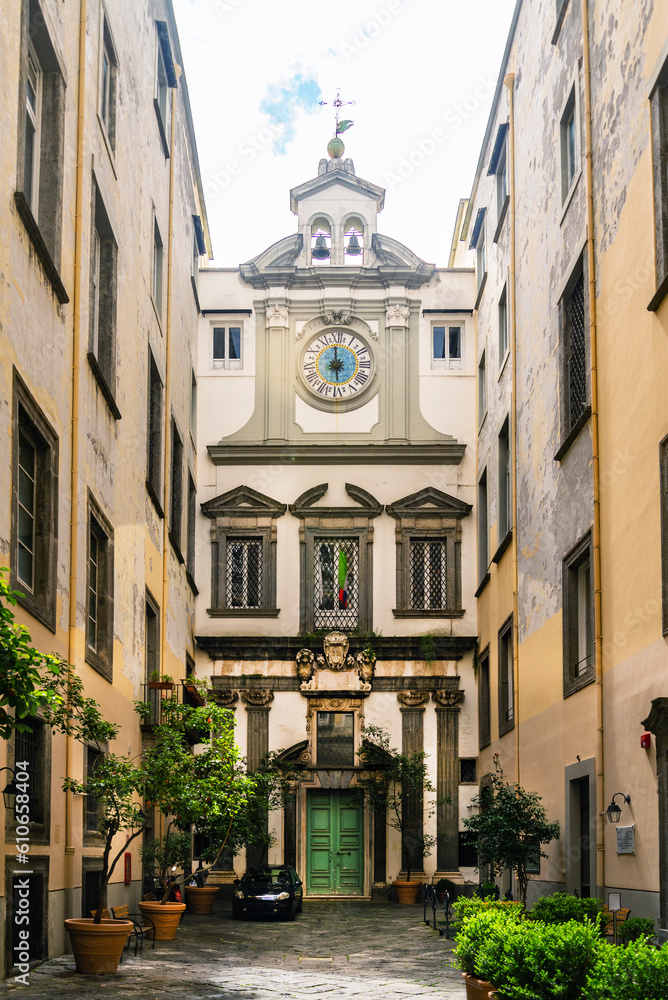 Building facade in Palazzo Ricca in the city center in Napoli Italy