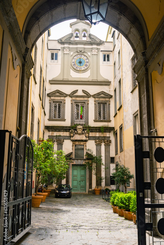 Fototapeta Naklejka Na Ścianę i Meble -  Building facade in Palazzo Ricca in the city center in Napoli Italy