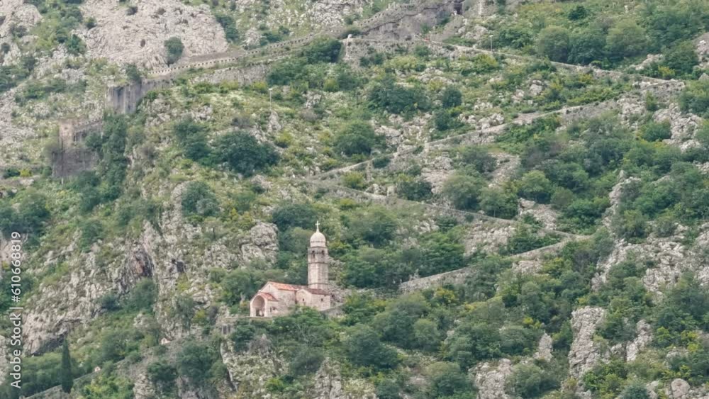 The Church of St. George on the path of tourists climbing to Kotor Fort in Montenegro The Church of St. George on the path of tourists climbing to Kotor Fort in Montenegro