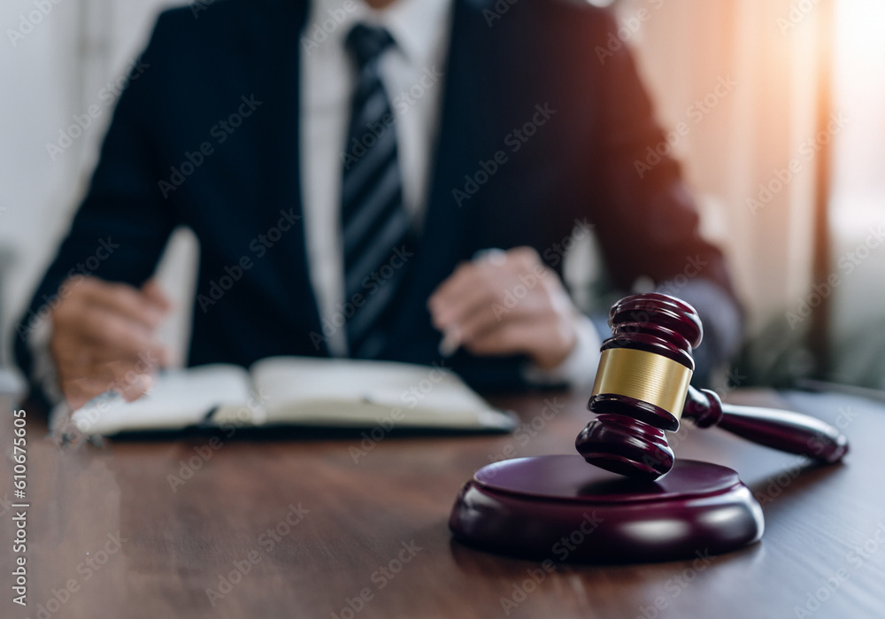 man in beautiful lawyers suit with a gavel man in beautiful lawyers suit with a gavel