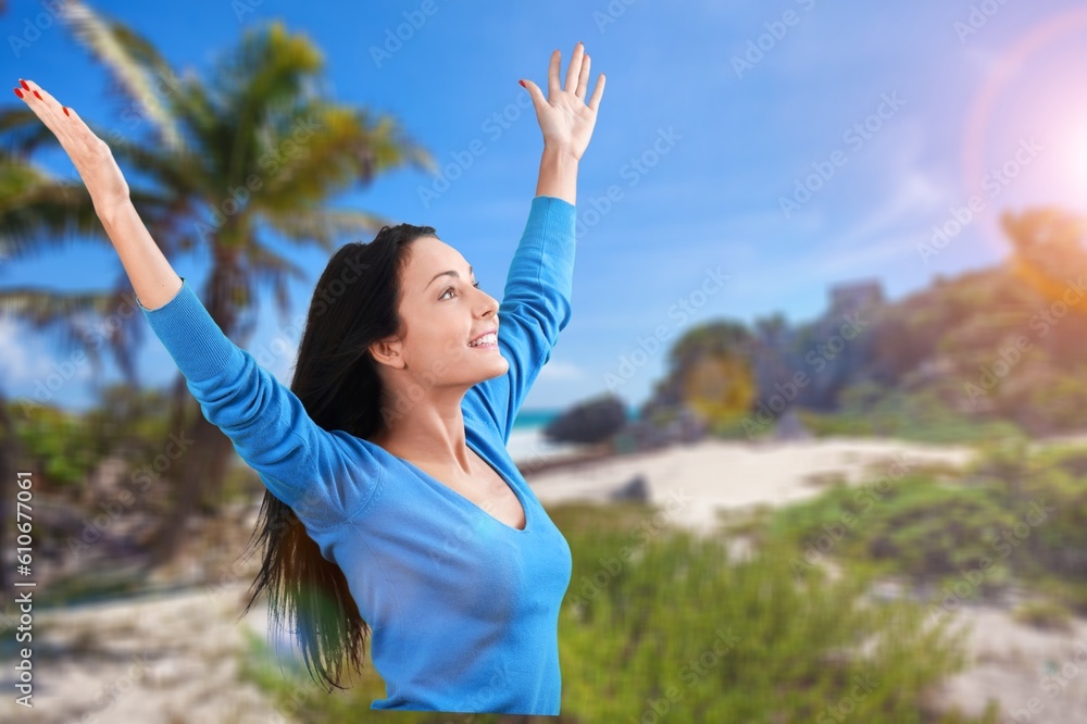 Young Woman breathe and stretching on beach Young Woman breathe and stretching on beach