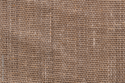 Linen crumpled texture natural fabric background closeup
