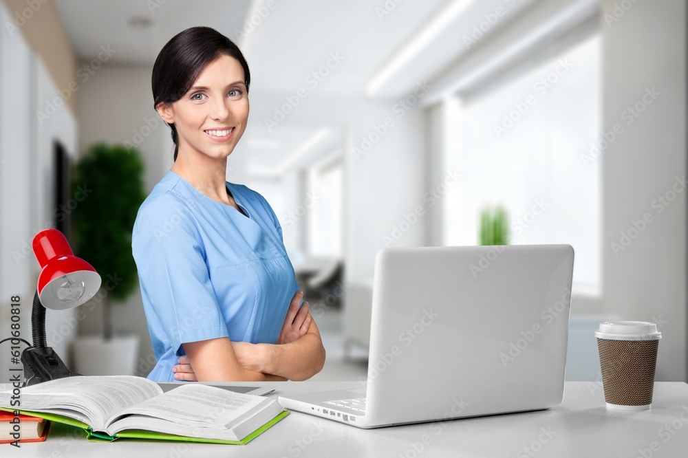 Young doctor beautiful woman working with a laptop Young doctor beautiful woman working with a laptop