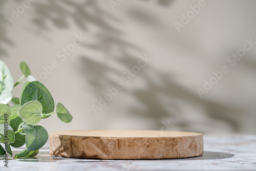 Wooden podium with leaves