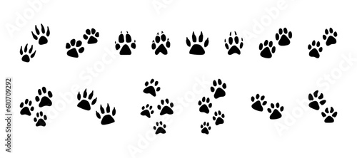 Set of black vector paw prints. Animal prints silhouettes, collection of illustrations for pets, animal protection theme, nature reserves, homeless animal shelters, pet stores and veterinary clinics.