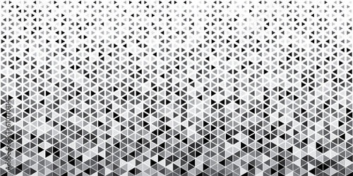 Abstract geometric background with grey and white color tone triangle shapes.