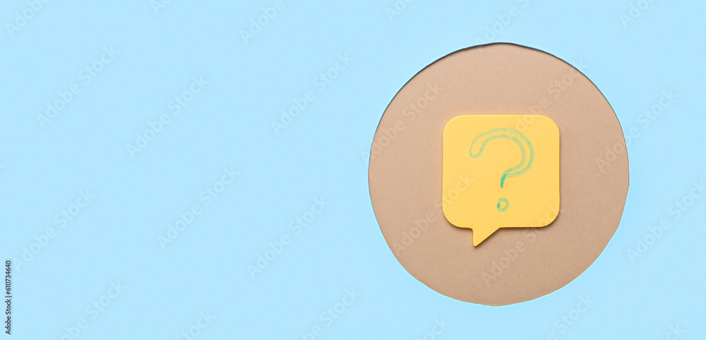 Sticky paper with question mark on light blue background with space for text Sticky paper with question mark on light blue background with space for text