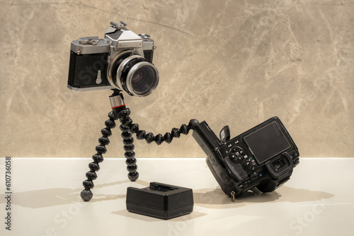 Old analog camera replacing battery for a digital camera 